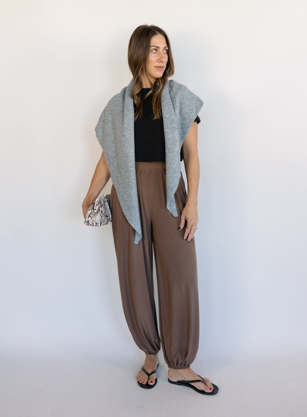 Woman wearing the Rome Relaxed Fit Balloon Pants in Coffee, brown high-rise pull-on balloon pants