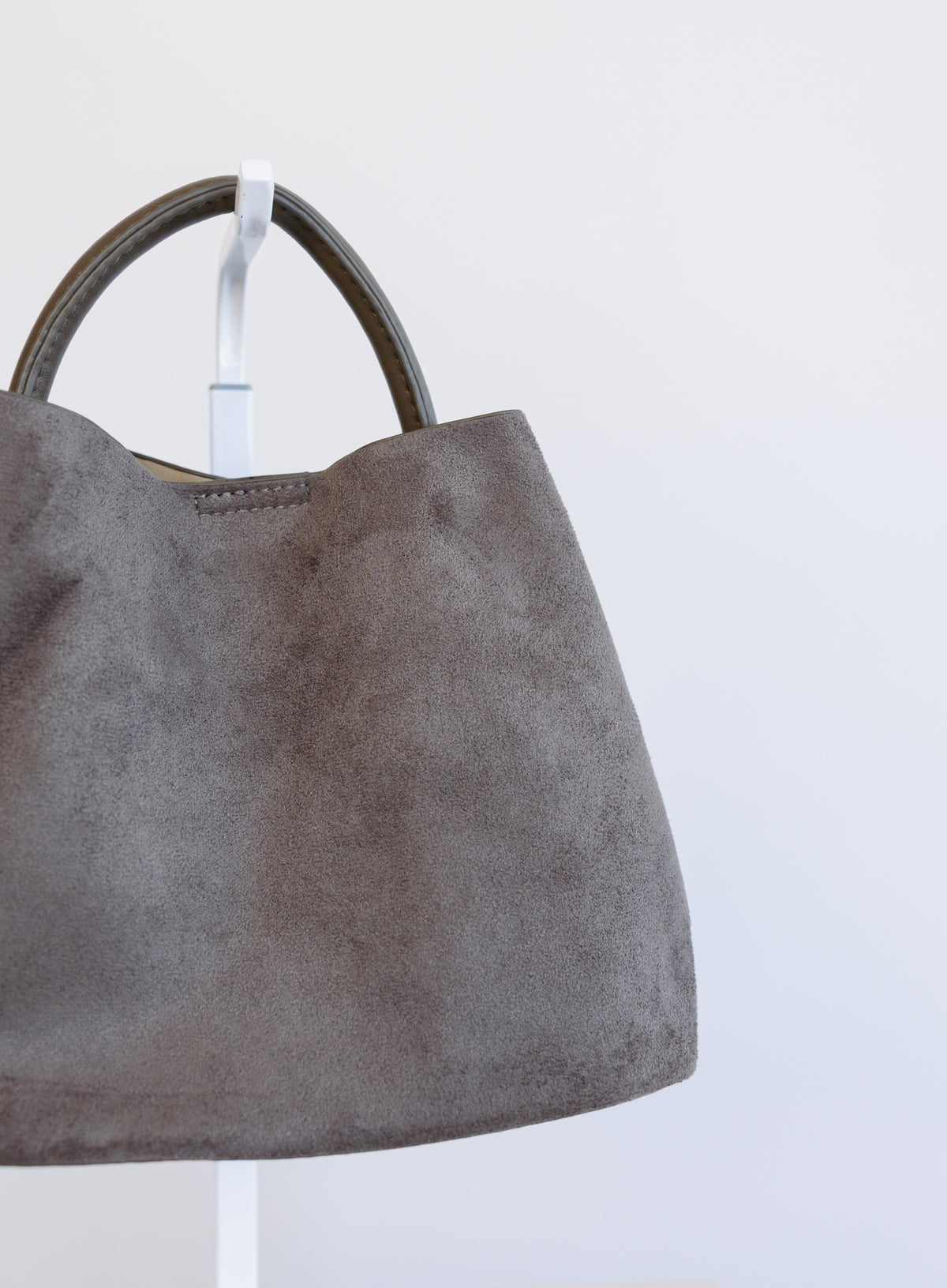 Lucia Bag in Taupe, a slouchy suede hobo bag with a rounded top handle