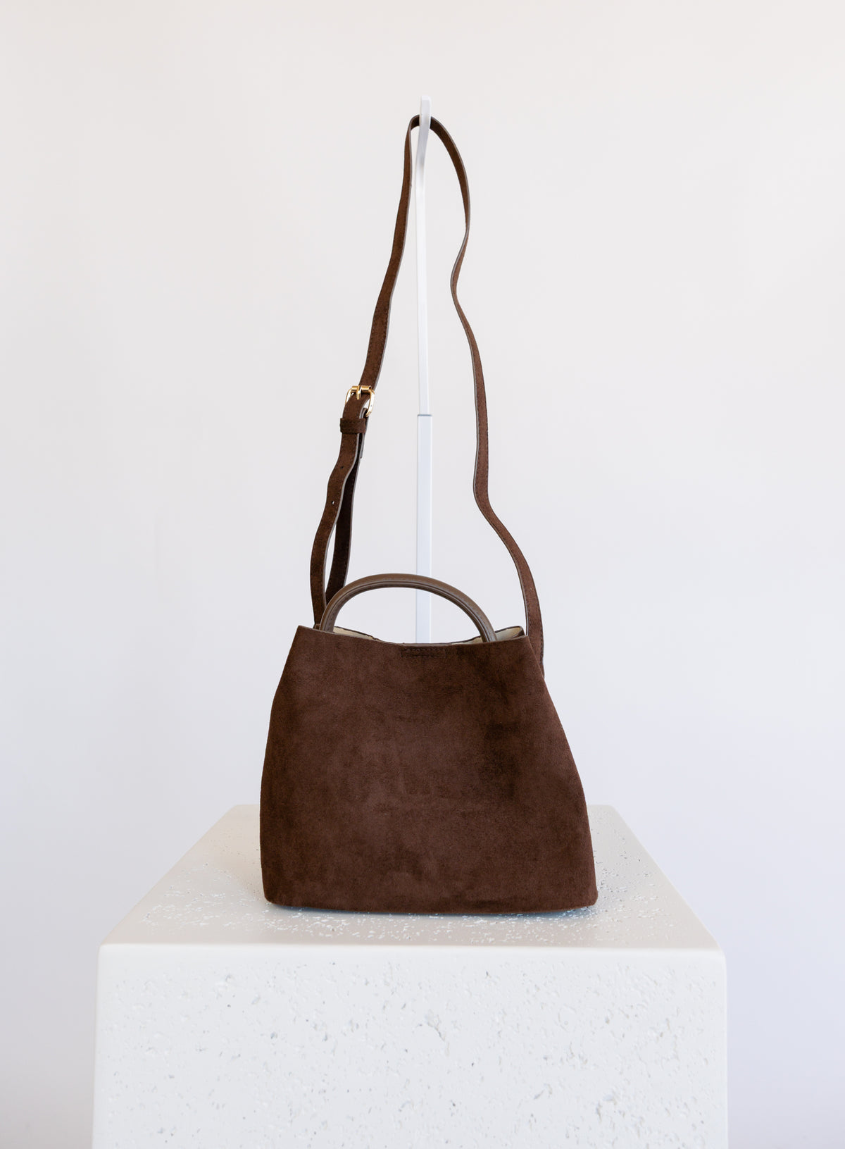 Lucia Bag in Chocolate, a slouchy suede hobo bag with a rounded top handle
