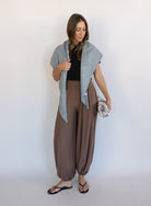 Woman wearing the Rome Relaxed Fit Balloon Pants in Coffee, brown high-rise pull-on balloon pants