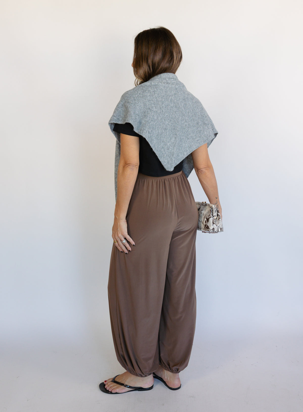 Woman wearing the Rome Relaxed Fit Balloon Pants in Coffee, brown high-rise pull-on balloon pants