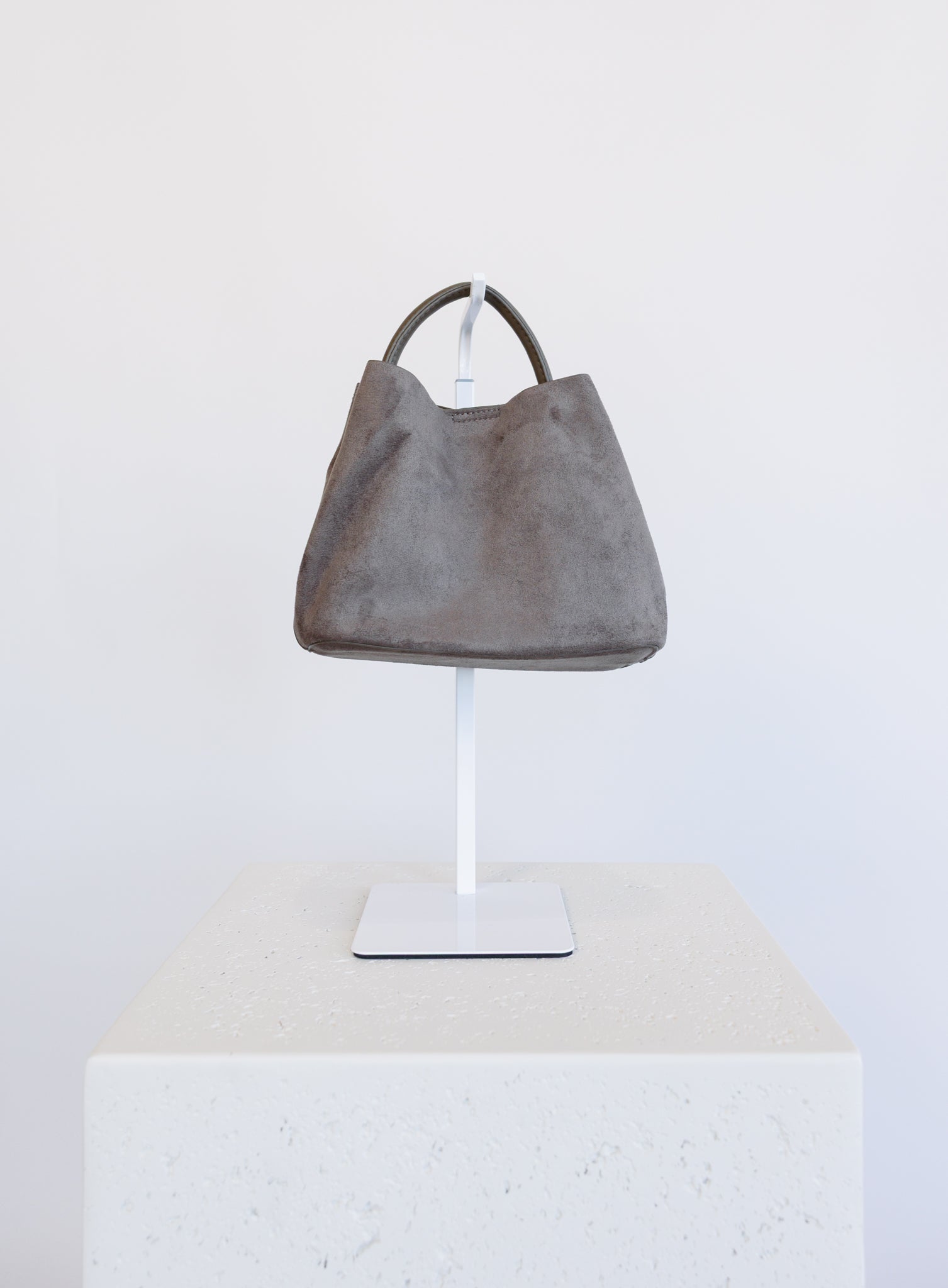 Lucia Bag in Taupe, a slouchy suede hobo bag with a rounded top handle