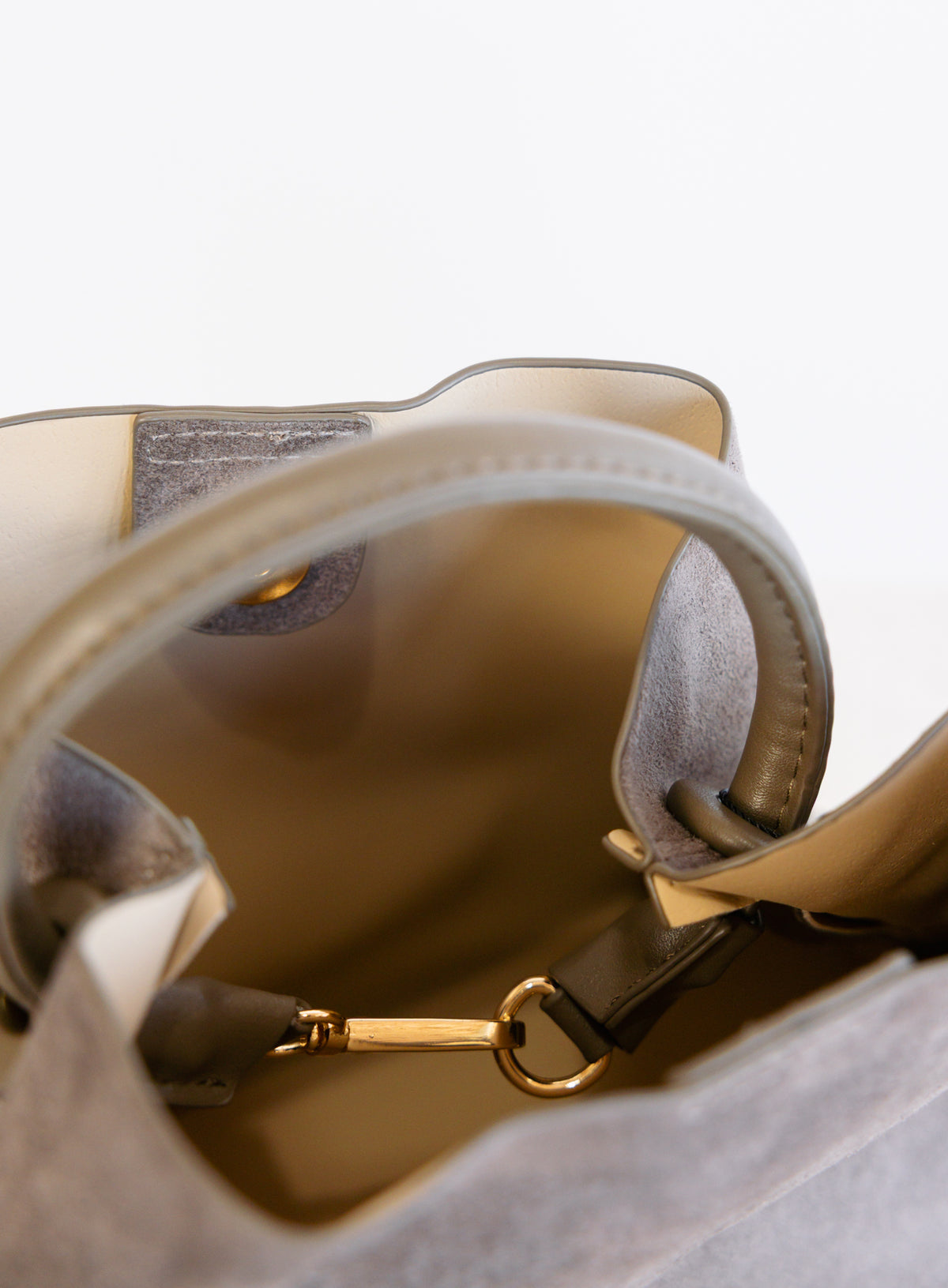 Lucia Bag in Taupe, a slouchy suede hobo bag with a rounded top handle