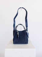 Giselle Suede Bag in Navy, a slouchy suede tote with navy and white leopard scarves on the handles