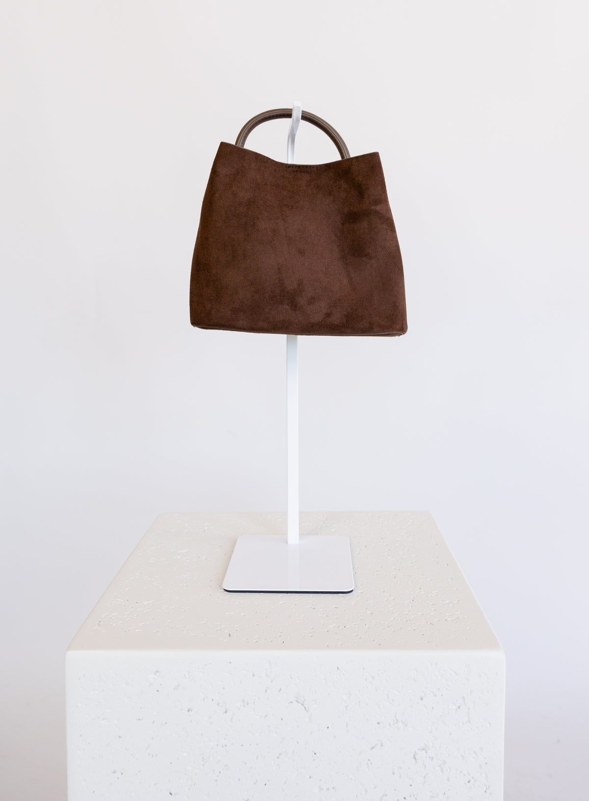 Lucia Bag in Chocolate, a slouchy suede hobo bag with a rounded top handle