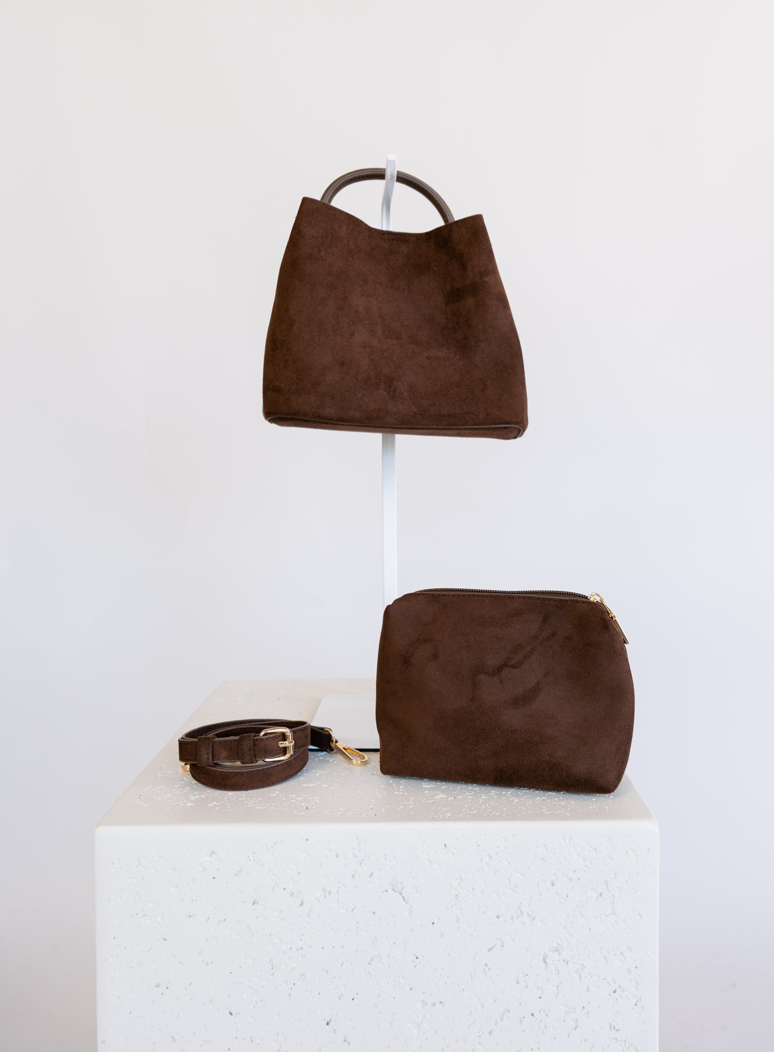 Lucia Bag in Chocolate, a slouchy suede hobo bag with a rounded top handle