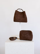 Lucia Bag in Chocolate, a slouchy suede hobo bag with a rounded top handle