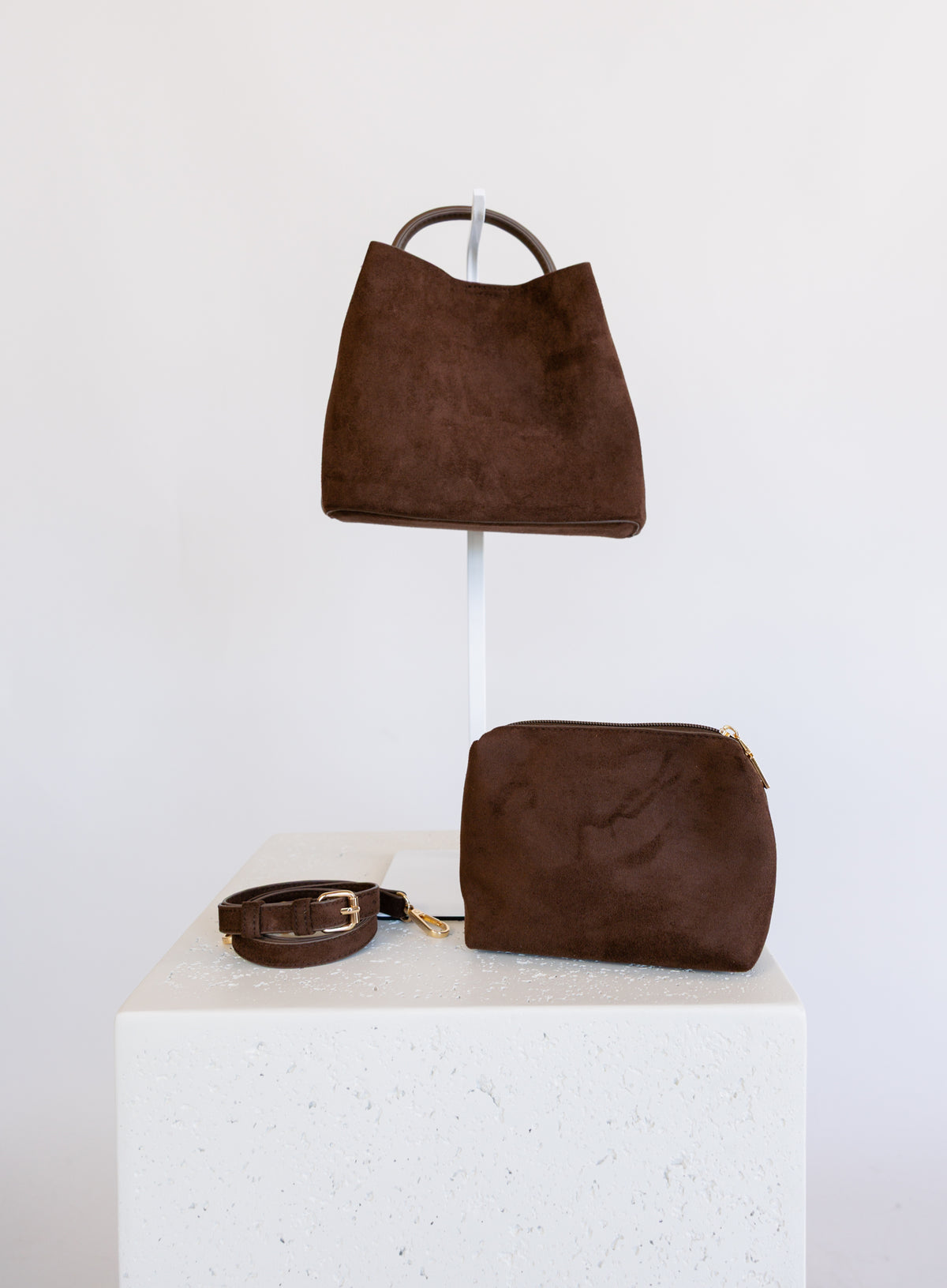 Lucia Bag in Chocolate, a slouchy suede hobo bag with a rounded top handle